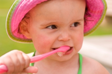 Girl Brushing Teeth - Pediatric Dentist in Falls Church, VA